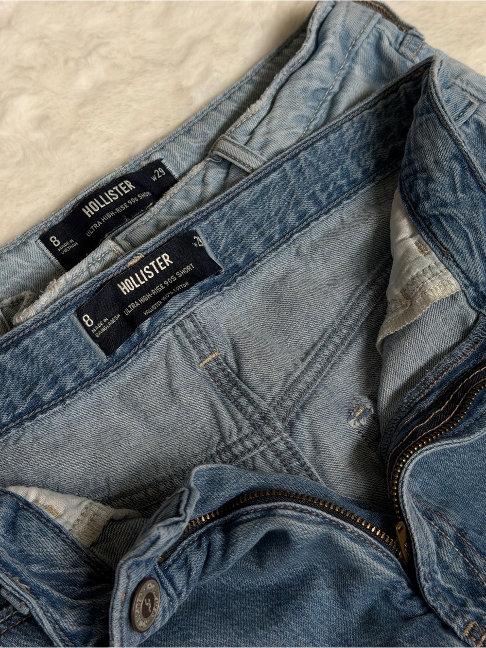 Two pairs of Hollister Women’s High-Rise Denim Shorts - Light Blue and Dark Blue - Picture 2 of 7